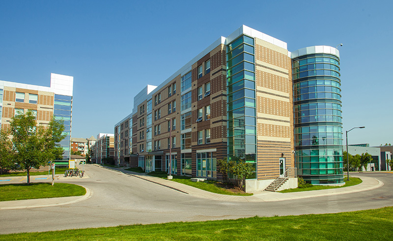 The West Residence building made of mixed brick and glass.