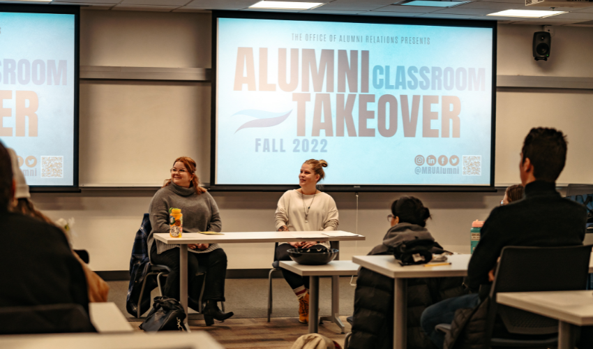 Two alumni presenting to a class of MRU students during Alumni Classroom Takeover