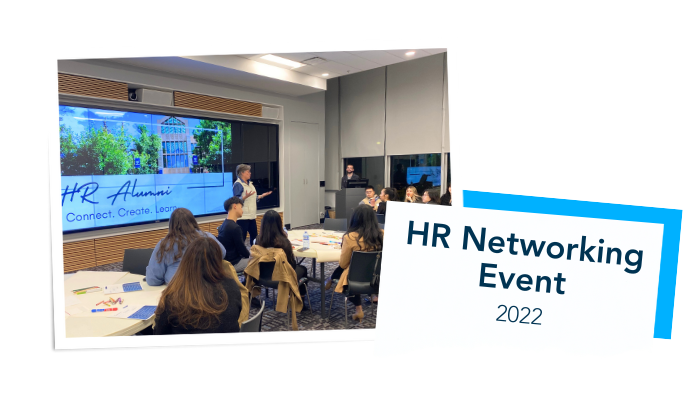 A presenter explaining an activity at the 2022 HR Networking Event
