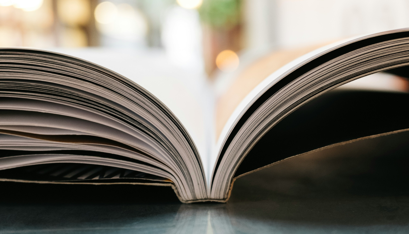 A book open on a table.