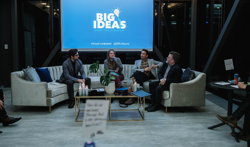 Four people recording the Big Ideas Podcast