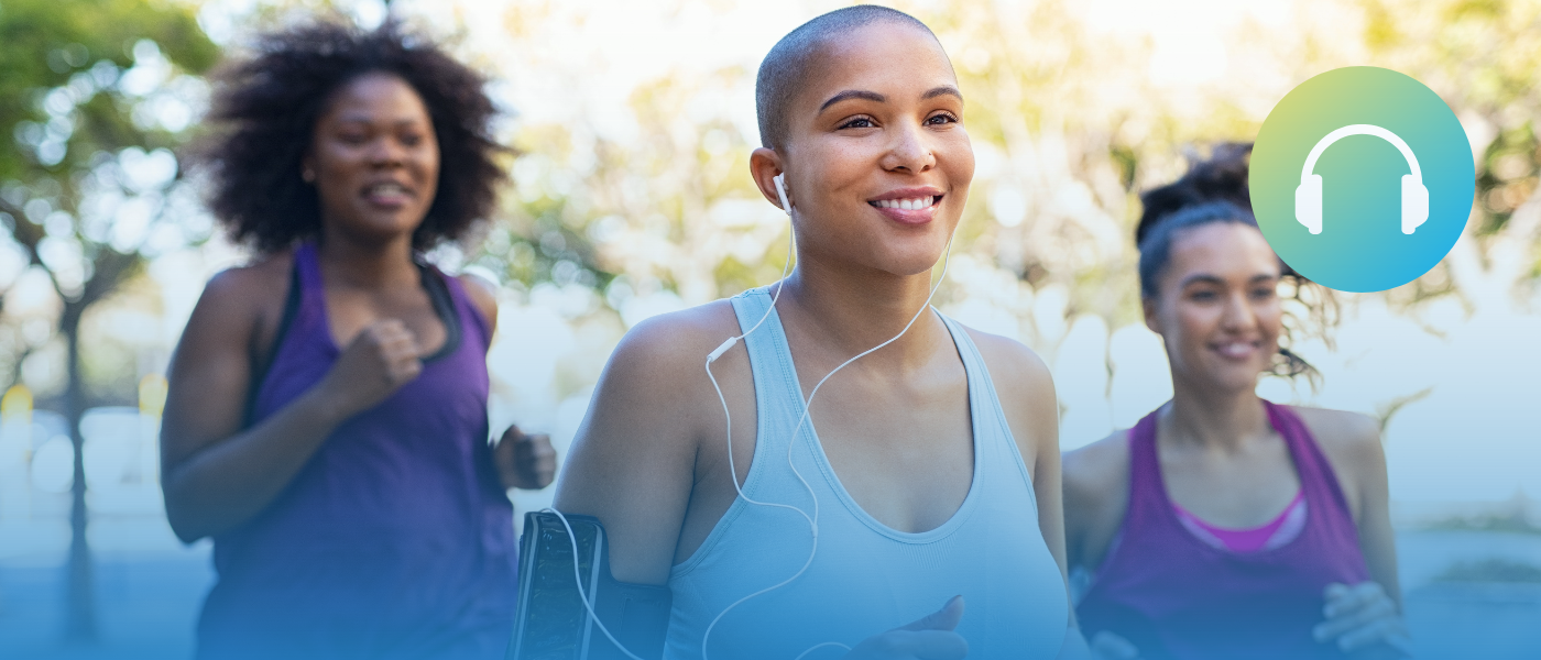Three people out on a run. One has headphones in their ears.