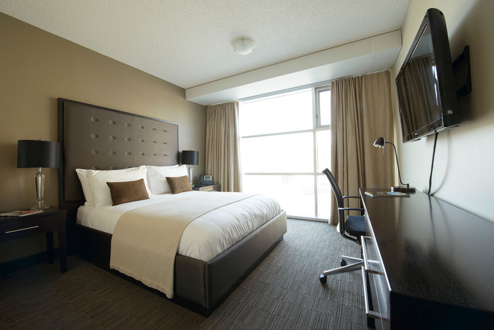 Picture of a bed/room in Residence's Hotel Suite.