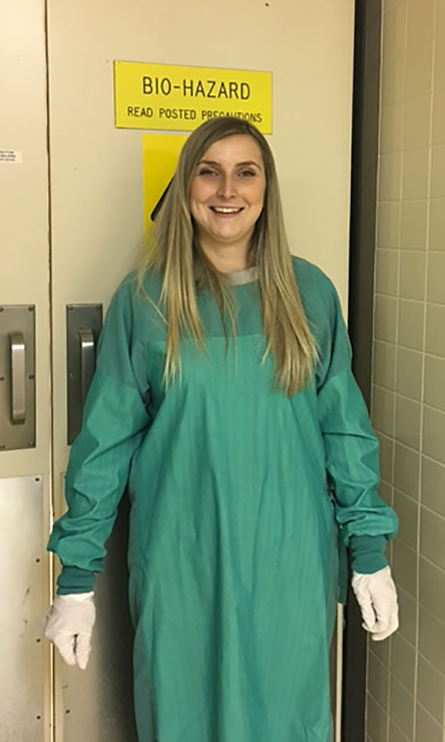 Taylor Dube-Mather at work in the Office of the Chief Medical Examiner.