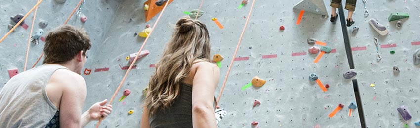 A recreation member prepares to climb the Mount Royal Recreation climbing wall