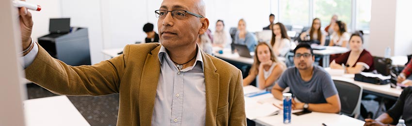 A faculty member instructs a class