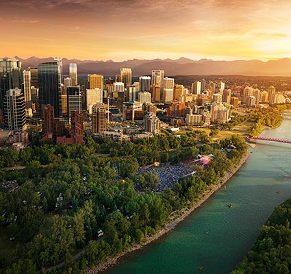 View of Calgary's downtown and Bow River at sunset.