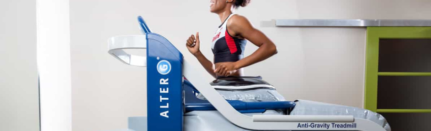 Woman running on anti-gravity treadmill