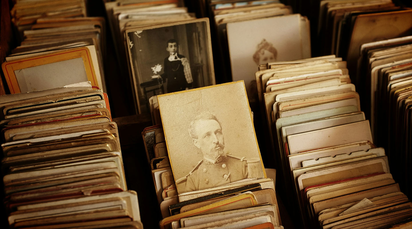 Boxes of historic portraits, with a portrait of a soldier displayed prominently.