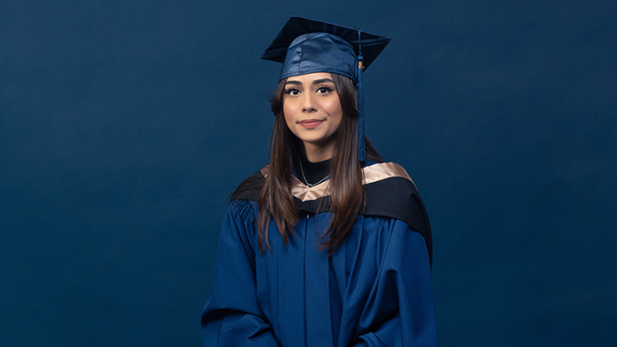 MRU alumna Naavneet Aulakh wearing graduation regalia