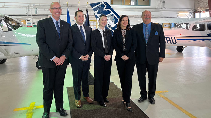 Tim Rahilly, PhD, president and vice-chancellor at MRU, Demitrios Nicolaides, PhD, minister of advanced education, Ashleigh Morrow, second-year MRU aviation student, Jennifer Bue, interim chief financial officer at WestJet Group and Richard Gotfried, MLA for Calgary-Fish Creek.