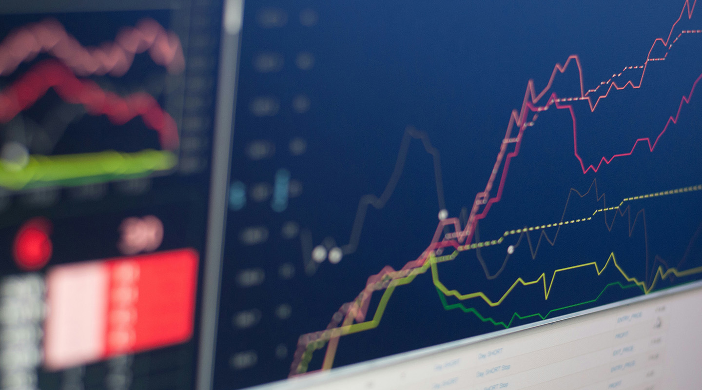 A screen with tables of data, line graphs and other charts.