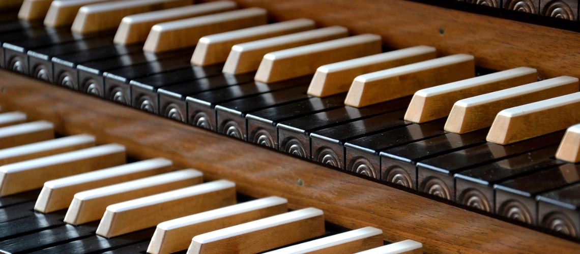 Close up photo of organ keys.
