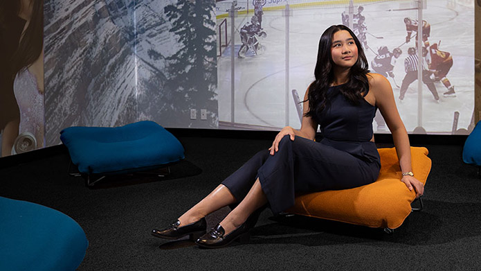 Photo of MRU student Nina Petinglay sitting in the Immersion Studio