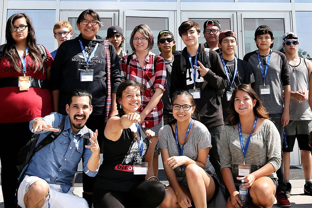 Attendeeds of the MEG Energy Summer Science Camp pose for the camera.