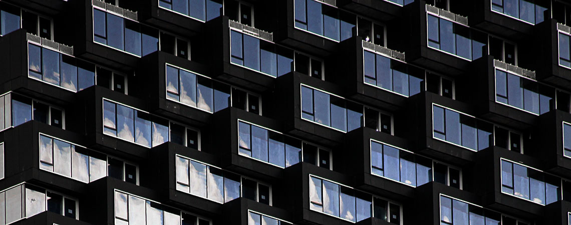 Rows of apartment balconies in downtown Calgary.