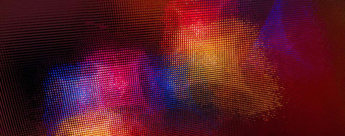 Close up of multicoloured LED lights that create a screen.