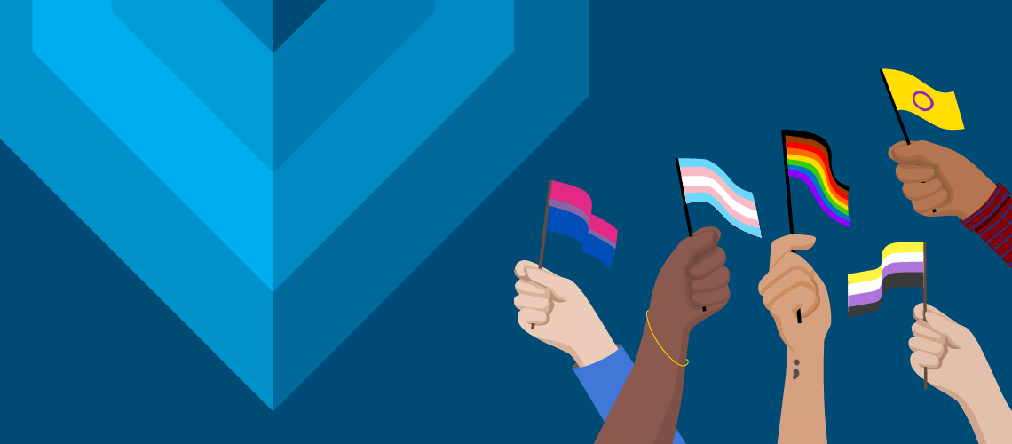 Hands holding a variety of pride flags on a blue chevron background.