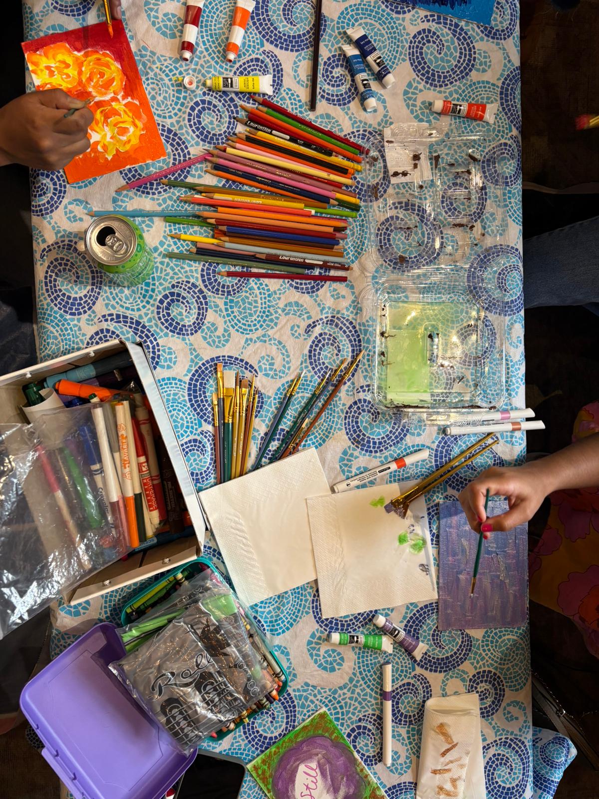 Close-up of some of the paintings created at my Community Gathering